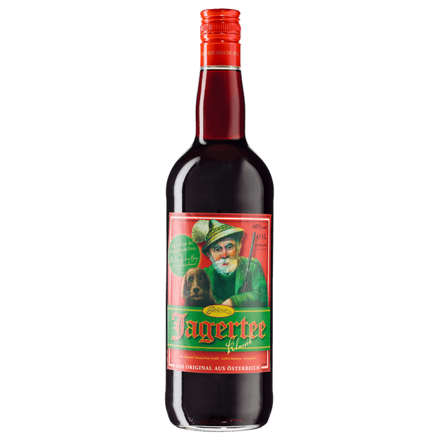 Eine 1L Flasche Prinz Jagertee Klassik 40% von der Feinbrennerei Thomas Prinz, mit einem grün-roten Etikett, auf dem ein Mann mit Hut und ein Hund abgebildet sind, die authentische österreichische Jagertee Tradition verkörpern.