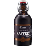 Die dunkle Glasflasche Prinz Nobilant Kaffee Liqueur 37,7% (0,5L) der Feinbrennerei Thomas Prinz mit Bügelverschluss und braun-goldenem Etikett liefert satte Arabica-Röstaromen in jedem Schluck.