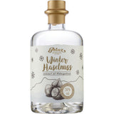 Feinbrennerei Thomas Prinz Winter Haselnuss 34,0% (0,5 Liter) Flasche mit winterlichem Etikett und Haselnussmotiv.