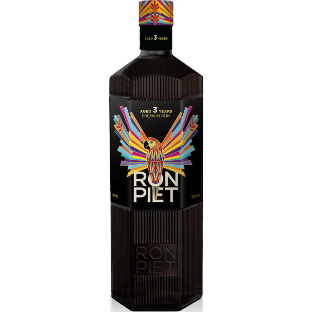 Ron Piet Premium Rum 3 Jahre 37,5% (0,7L) in einer schwarzen Flasche, mit einem lebendigen geometrischen Vogel-Etikett.