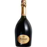Eine 0,75-Liter-Flasche Champagne Ruinart Brut R de Ruinart mit Goldfolie und Etikett auf dunklem Glas spiegelt die Eleganz dieses renommierten Champagnerhauses wider.
