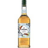 Eine 1-Liter-Flasche Giffard Vanille Sirup von Giffard mit einem blumigen Etikett und einer goldenen Flüssigkeit, die aus natürlichen Vanilleextrakten hergestellt wird.