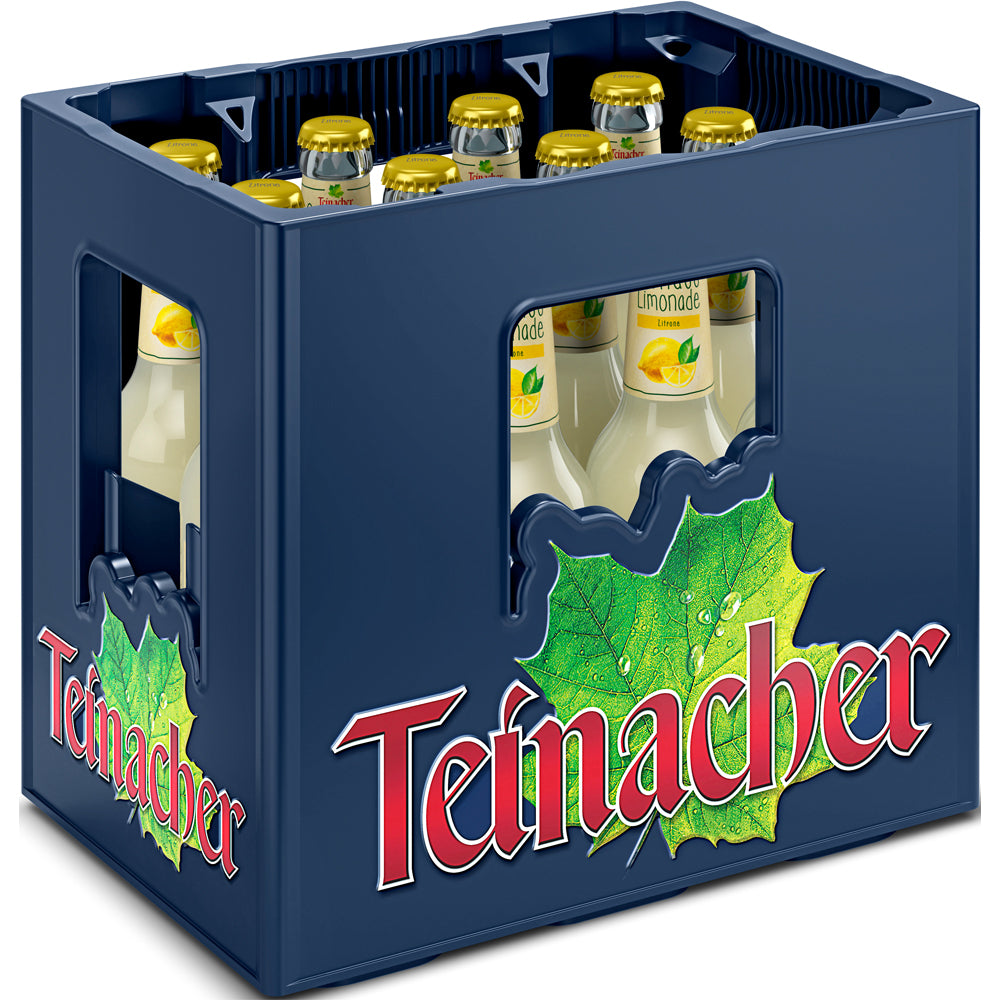 Eine blaue Kiste von Teinacher Mineralwasser enthält 12 Mehrweg 0,33L Flaschen Genuss-Limo Zitrone mit gelben Verschlüssen und grüner Blattgrafik, die den erfrischenden Geschmack aus dem Schwarzwald unterstreichen.
