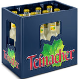 Eine blaue Kiste von Teinacher Mineralwasser enthält 12 Mehrweg 0,33L Flaschen Genuss-Limo Zitrone mit gelben Verschlüssen und grüner Blattgrafik, die den erfrischenden Geschmack aus dem Schwarzwald unterstreichen.