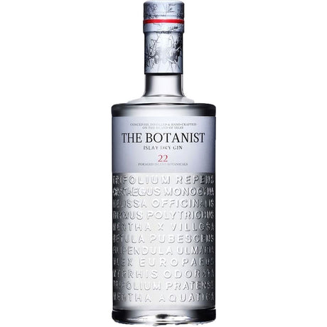 Eine 0,7-Liter-Flasche The Botanist Gin Islay Dry Gin (46%), ein schottischer Premium-Gin mit botanischen Namen, die in die untere Hälfte des Glases eingeprägt sind.