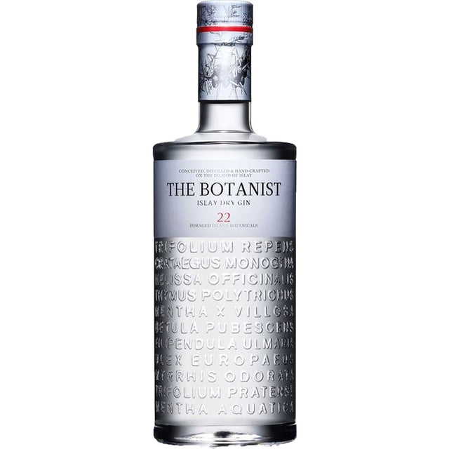 Eine 0,7-Liter-Flasche The Botanist Gin Islay Dry Gin (46%), ein schottischer Premium-Gin mit botanischen Namen, die in die untere Hälfte des Glases eingeprägt sind.
