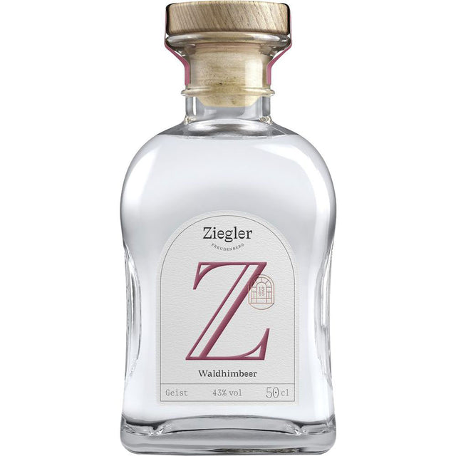 Ziegler Waldhimbeergeist 43% 0,5 Liter: Eine Klarglasflasche mit Holzkorken und weißem Etikett, hergestellt von Ziegler aus Waldhimbeeren für ein authentisches Obstbrand-Erlebnis.