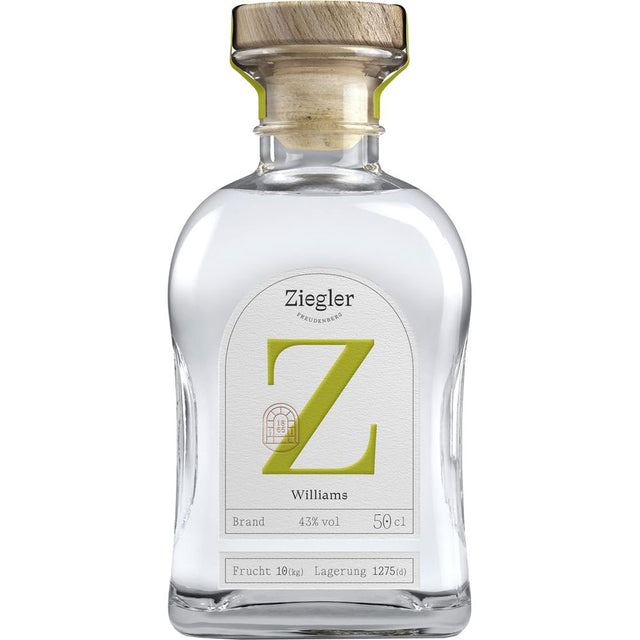 Eine Klarglasflasche Ziegler Williams Birnenbrand 43% 0,5 Liter von Ziegler mit einem Holzkorken und einem großen grünen Z auf dem Etikett, das den klassischen Williams-Christ-Birnenbrand hervorhebt.